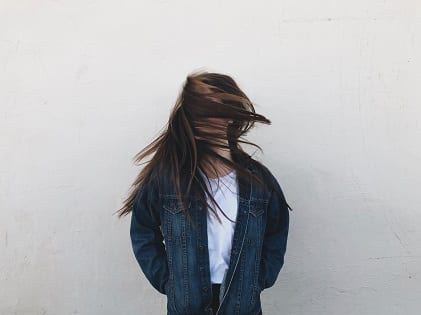 girl twirling hair