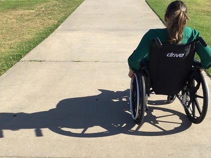 woman sitting on wheelchair