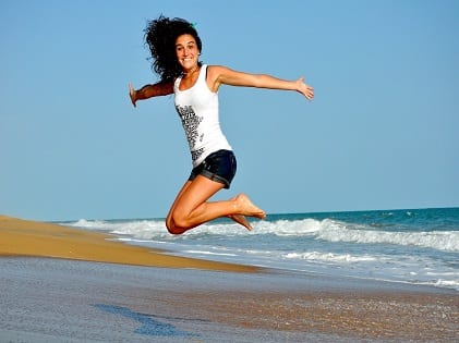 woman jumping healthy