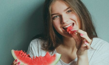 woman-wearing-white-shirt-eating-watermelon-1993660